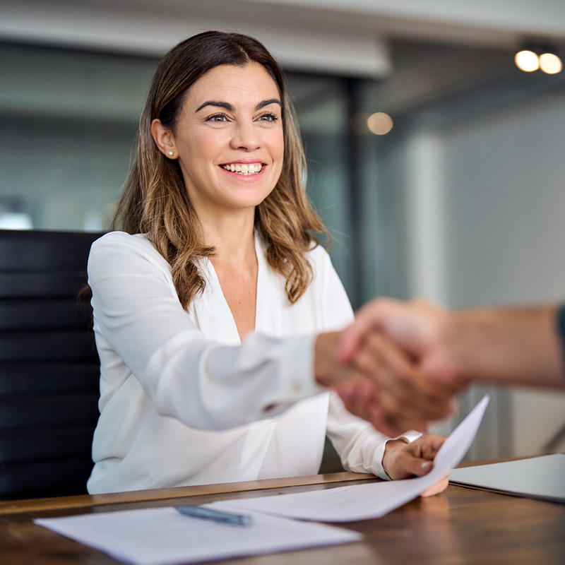 woman shaking hands with someone